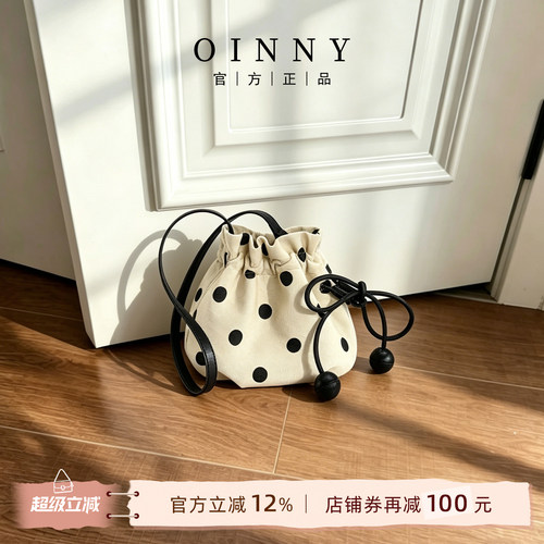 oinny复古黑白波点水桶包可爱风