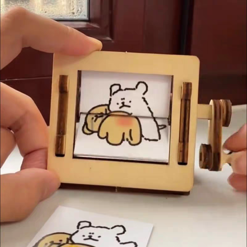 小红书同款线条小狗转动打屁股摇摇乐创意解压小玩具桌面装饰摆件