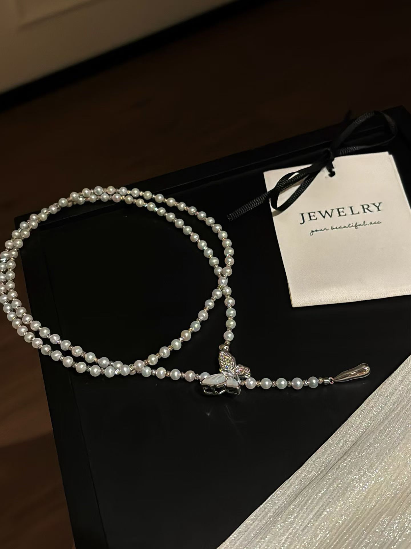 广西北海天然珍珠爆款上新蝴蝶扣珍珠水滴毛衣链蝴蝶扣设计显精致