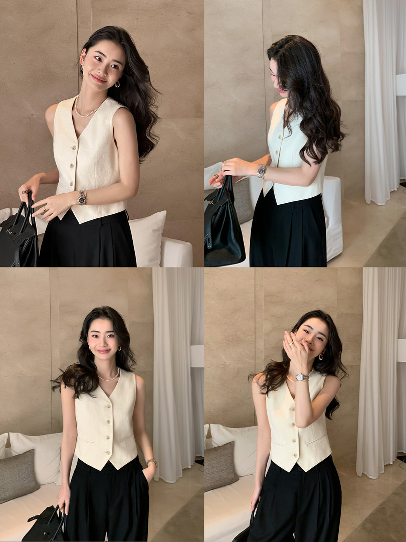 Cream sleeveless button-up vest worn by a model