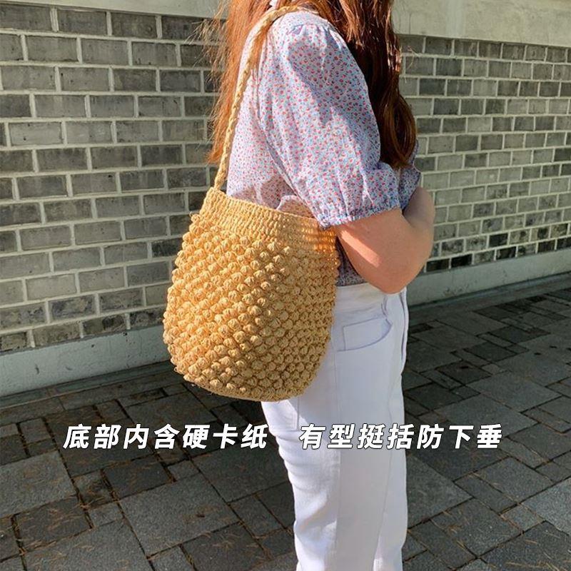 法式编织包女夏手工手织包包单肩草编藤编草包海边度假沙滩水桶包