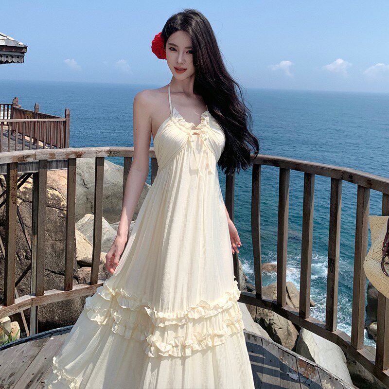速发法式海边度假挂脖吊带连衣裙夏泰国三亚旅游性感露背蛋糕长裙
