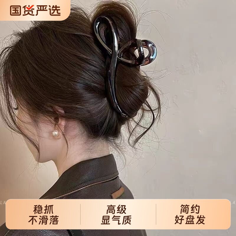 气质夏日抓夹女大号发量大图片
