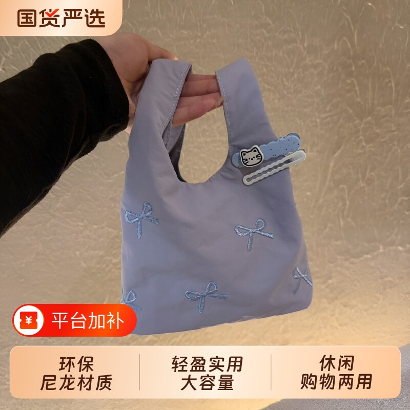 蝴蝶结简约刺绣迷你帆布包夏季百搭大容量通勤手拿包手提尼龙蓝色