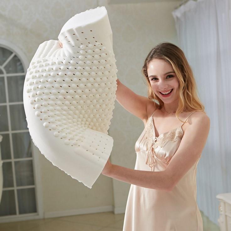 泰国天然乳胶枕头记忆橡胶保健护颈枕侧睡按摩双人枕芯防螨不变形