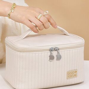 速发开盖蛋糕化UP色手提洗漱包纯妆品大容量高级感