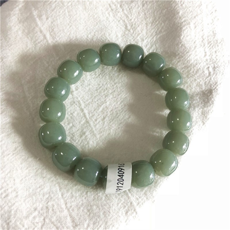 速发精品和田玉且末蓝老形珠手链油润度很好过灯结构少