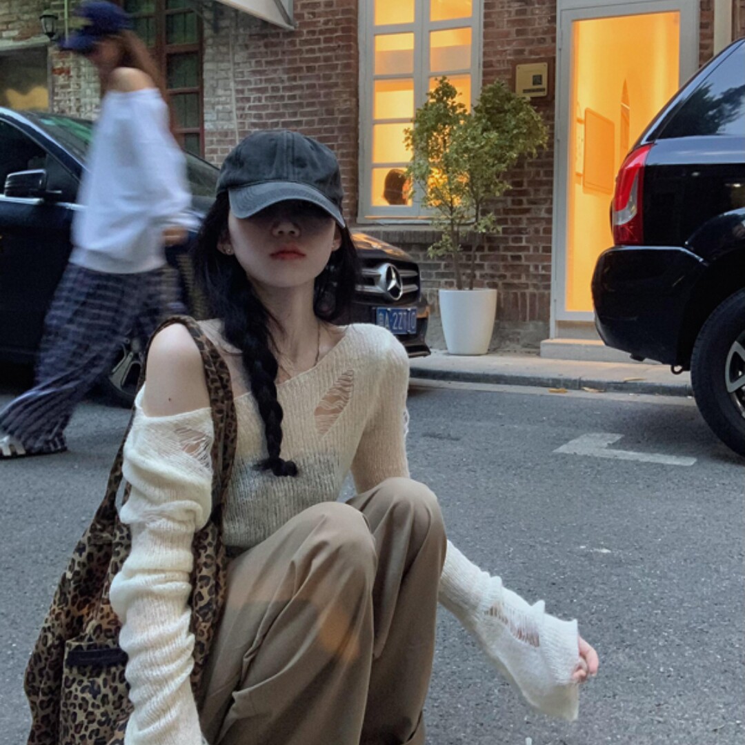 韩式氛围感穿搭 不规则镂空罩衫上衣女秋破洞喇叭长袖毛衣针织衫