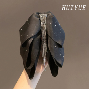 黑色蝴蝶结流苏抓夹女2024新款高级感满天星头饰后脑勺发夹子发卡