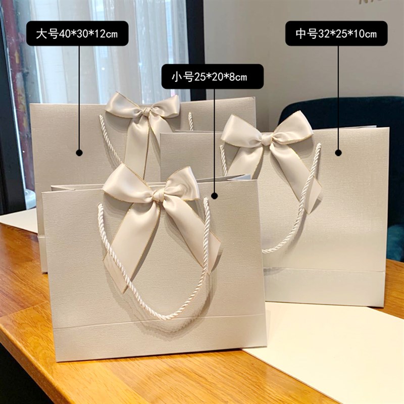 极速礼品压纹手提纸袋定制t印烫logo礼物包装蝴蝶W结服装购物袋现