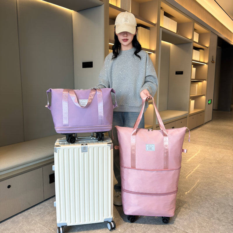 万向轮旅行包女大容量手提行李袋