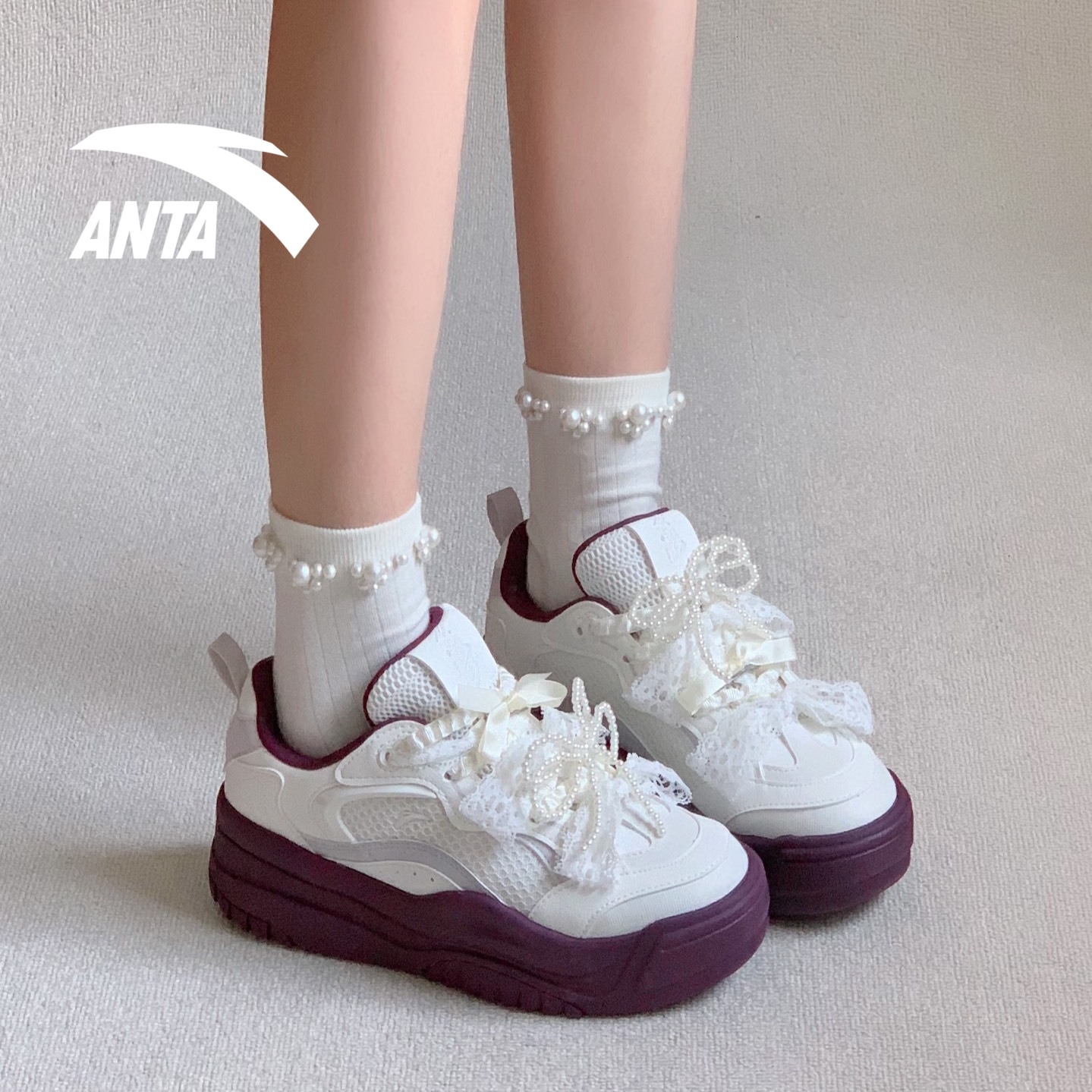 安踏板鞋女时尚撞色公主休闲鞋