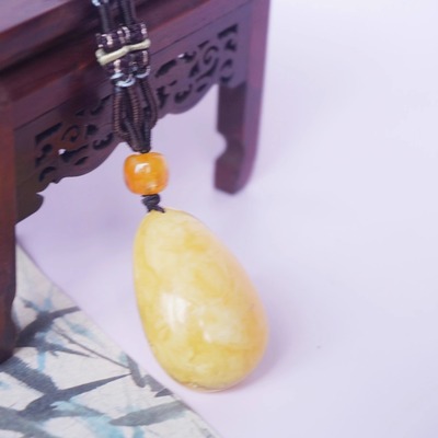 九紫离火佛宝护身蜜蜡水滴鸡油黄蜜蜡吊坠39*25*16重12.87gNO.872