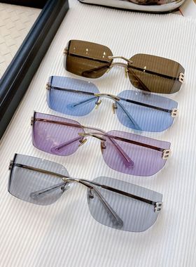 欧洲站时尚个性无框曲面太阳镜女防紫外线大框墨镜街头凹造型潮品