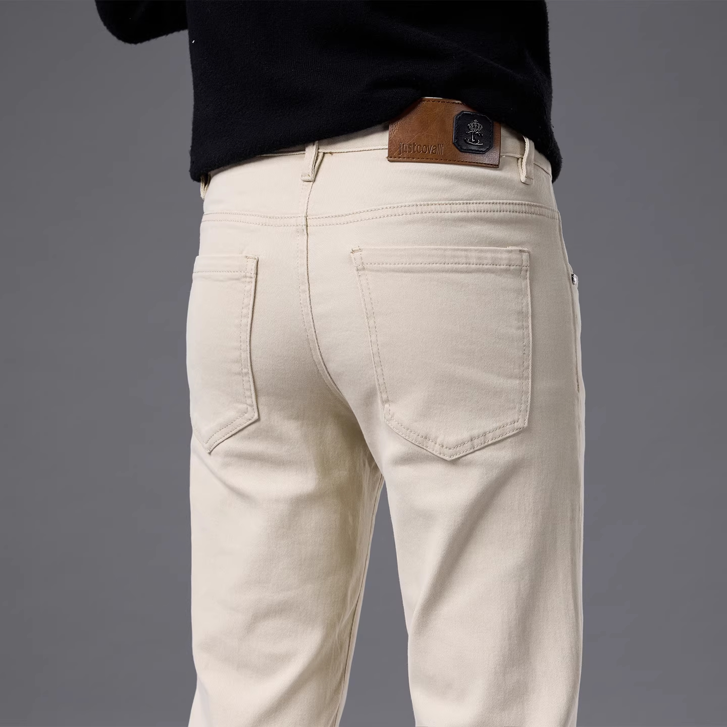 法国高端品牌米白色牛仔裤男士修身小脚弹力纯棉休闲裤子秋季新款