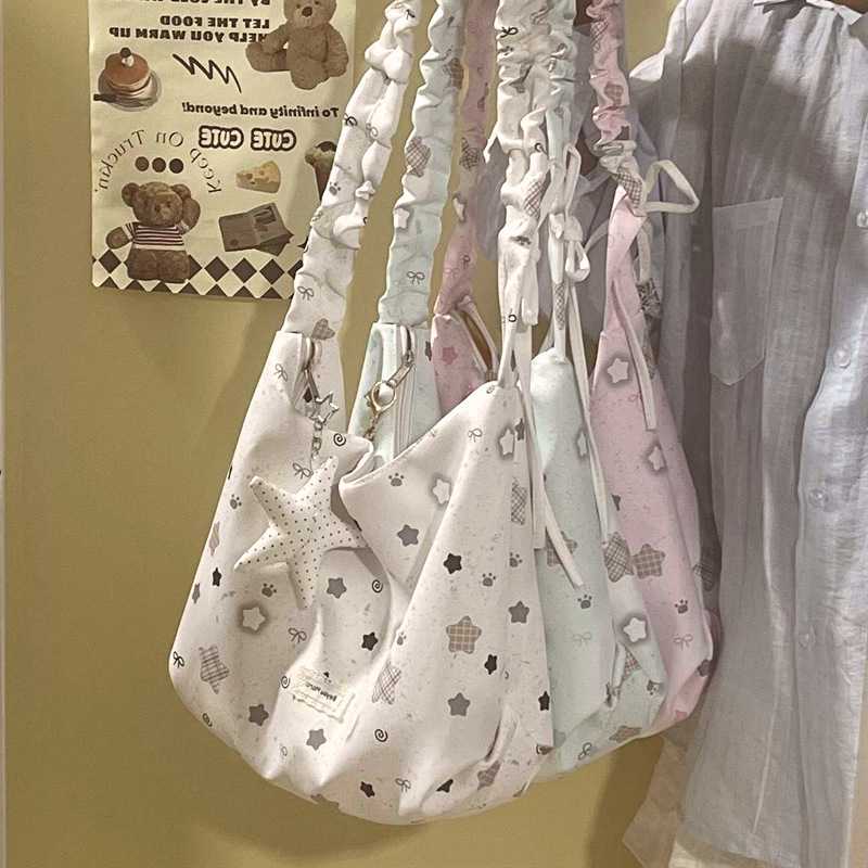 小众设计少女抽绳饺子包百搭学生