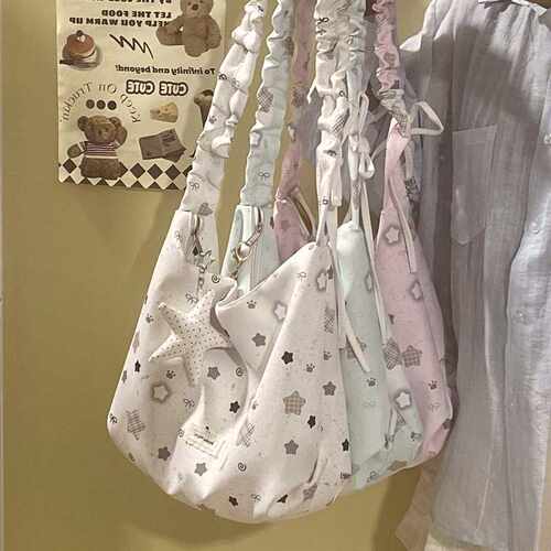 小众设计少女抽绳饺子包百搭学生