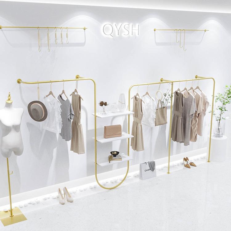 简约时尚服装店铁艺金色上墙展示架侧挂衣服架货架男女童装陈列架