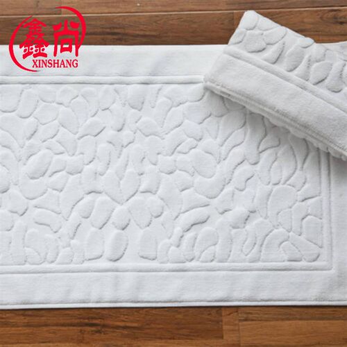 厂家纯棉21股酒店地巾地垫小脚丫鹅卵石提花白色吸水防滑地垫