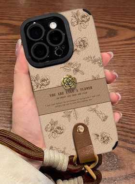 适用苹果16promax新款手机壳iPhone15pro山茶花公仔挂绳14硅胶高级13pro女款小众12瞳眼pl全包11防摔xs黑色xr