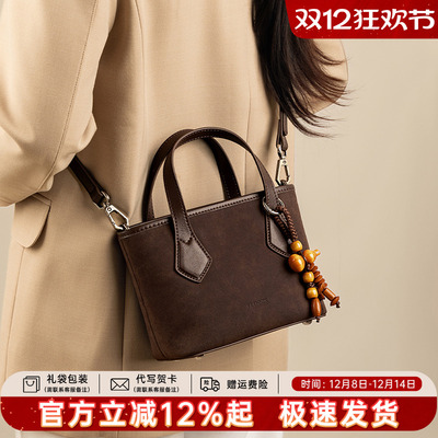 天美意真皮菜篮子包女2025新款百搭复古单肩斜挎包高级感水桶包