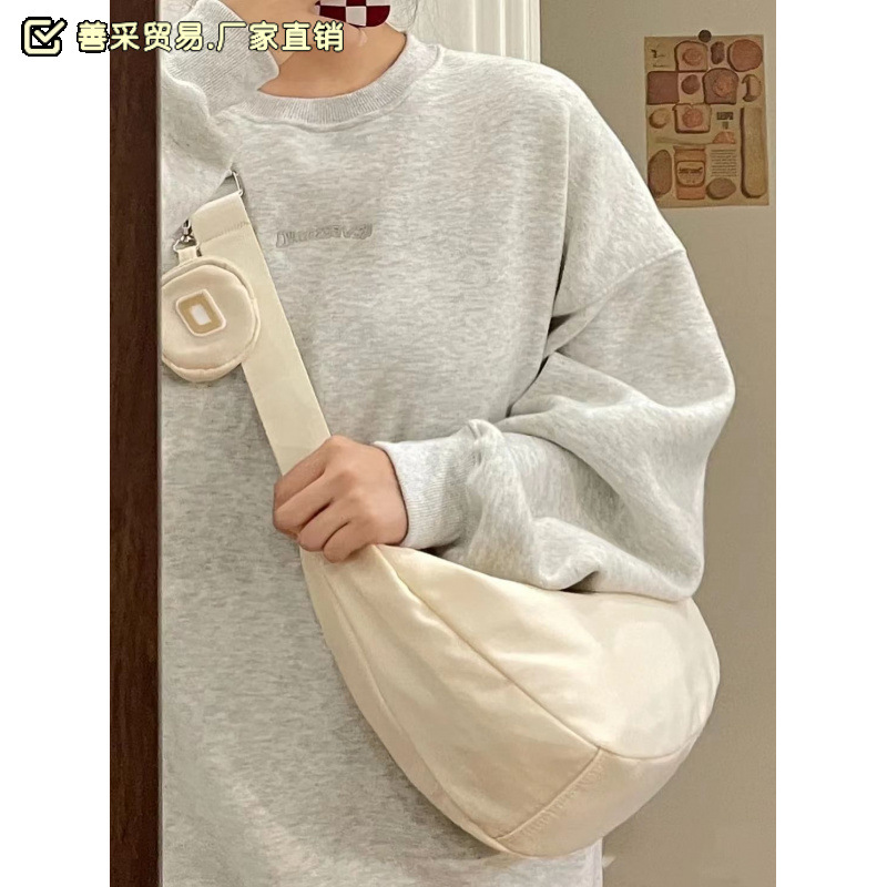 尼龙防水帆布包时尚潮包秋冬森系文艺饺子包大学生上课单肩斜挎袋