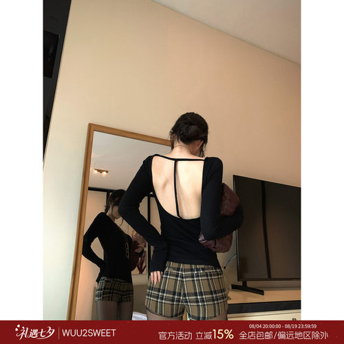 吴太甜露背镂空黑色长袖T恤女