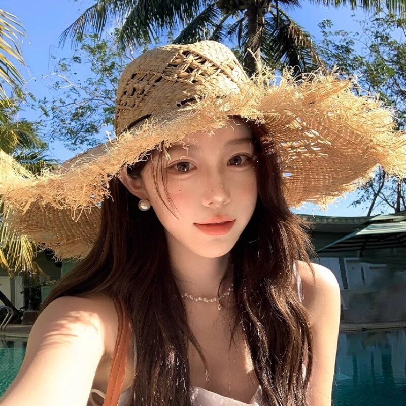 镂空拉菲草帽女2026新款海边沙滩三亚度假拍照大檐防晒遮太阳帽子