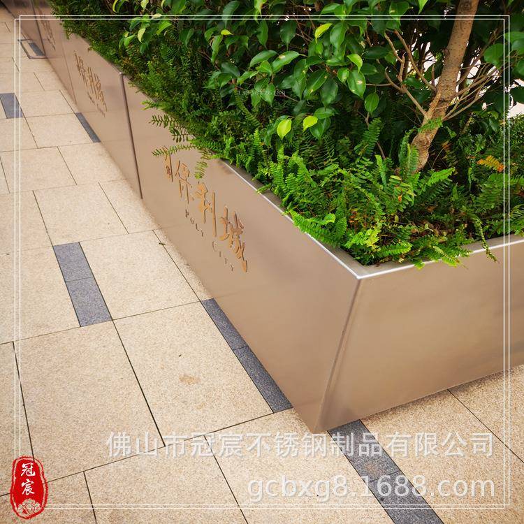 重庆地产售楼部入口水池装饰仿古铜不锈钢花钵安装实物效果图