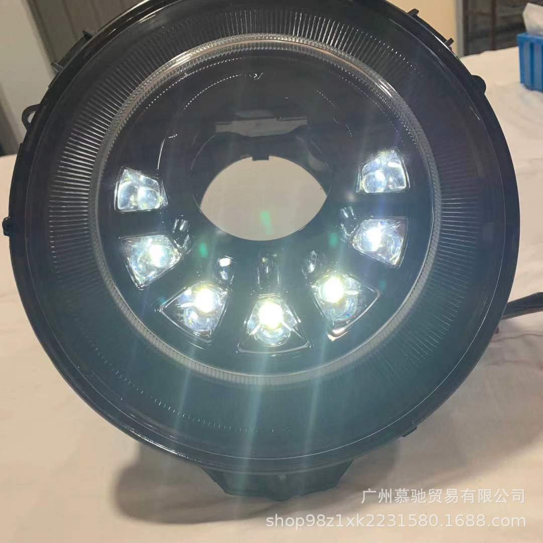 适用W463奔驰大G级g500g63g350g400g55改装泪眼大灯熏黑暗夜大灯