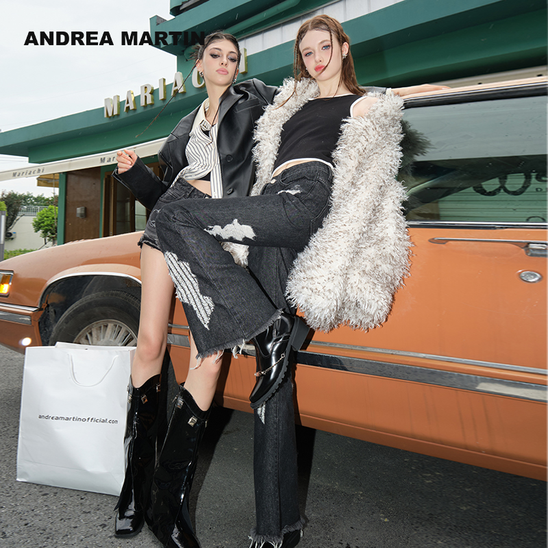 黑色破洞牛仔喇叭裤