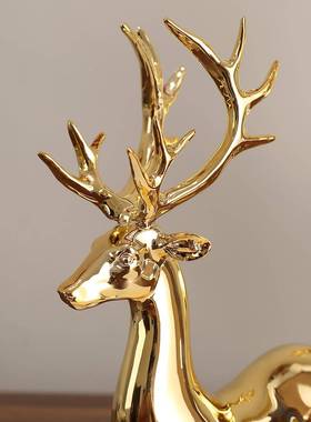 金色麋鹿电轻视柜ERW件现代奢家居装饰品客镀厅电工艺酒柜摆金鹿