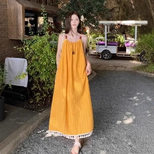 连衣裙女黄色海边度假吊带气质2025新款 长裙春季 流苏显瘦宽松时尚