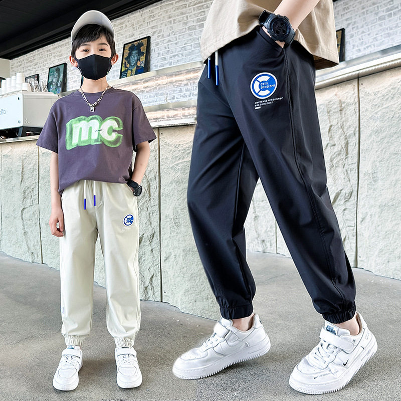 Z971早阳童2023年夏季新款中大童轻薄个性时髦帅气贴标防蚊裤男童
