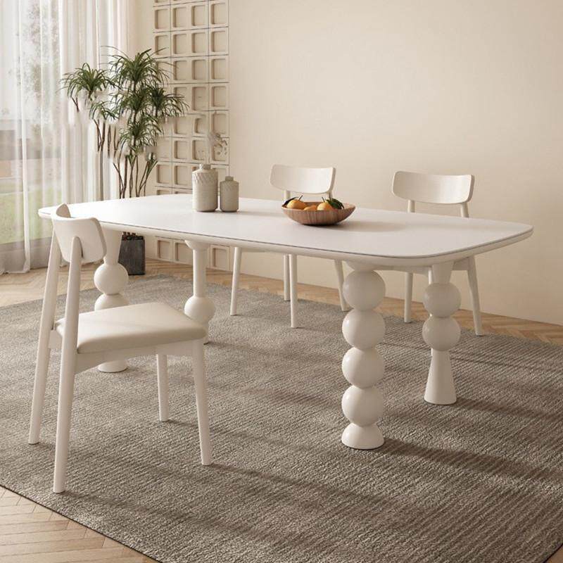 现代简约家用椭圆形桌子奶油风大小户型饭桌创意法式纯白岩板餐桌