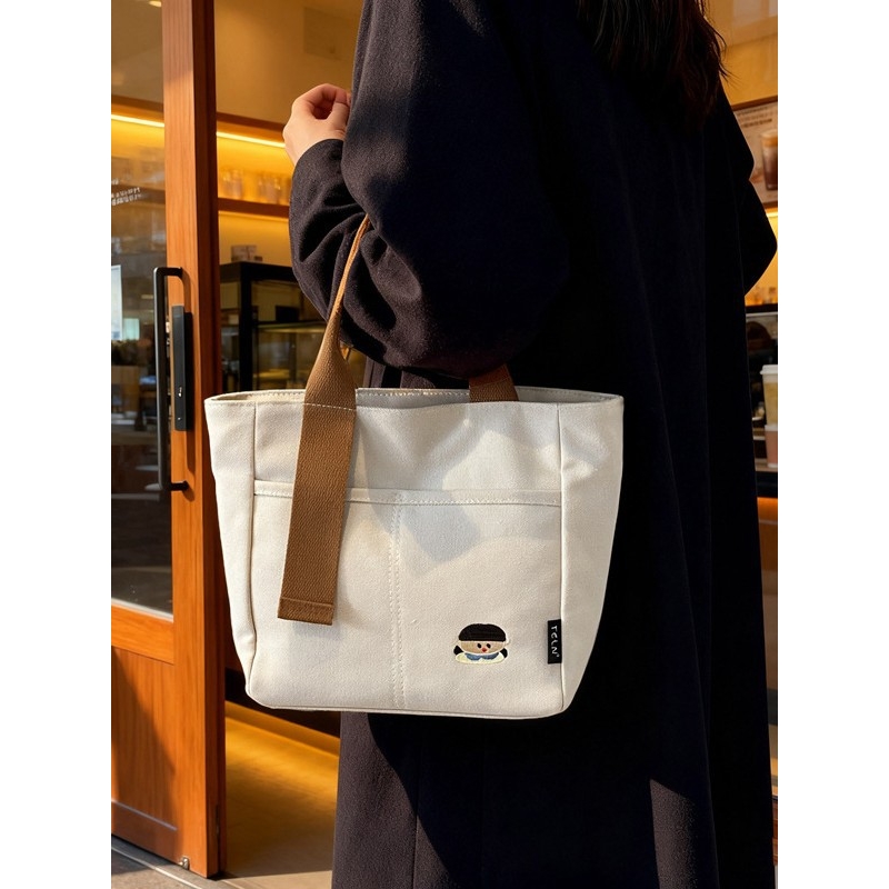 日本品质休闲帆布包女纯色手提包百搭简约小包时尚逛街包帆布袋手