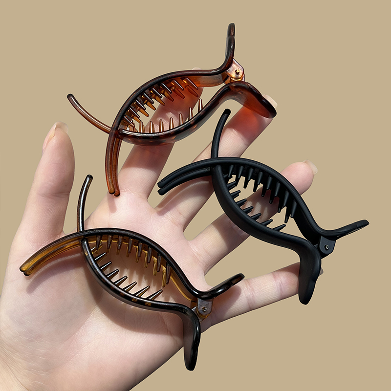 苏小北质感磨砂丸子头抓夹女