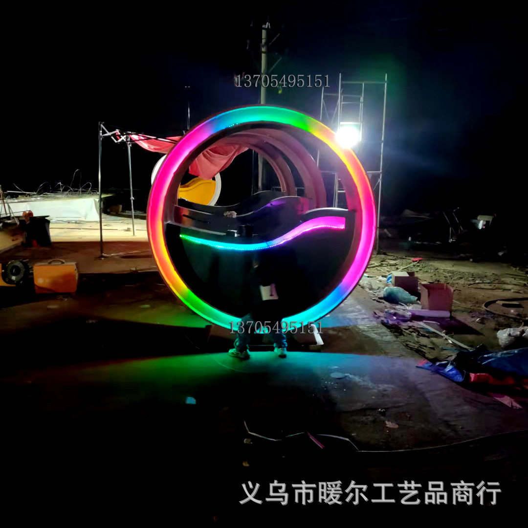 义乌暖尔外公园广场不锈钢圆形造型七彩发光脚踩传感景观互动单车