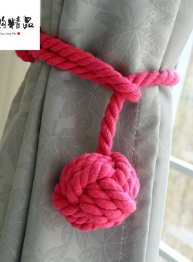 Curtain container decoratDion strap on curtain a paxir of