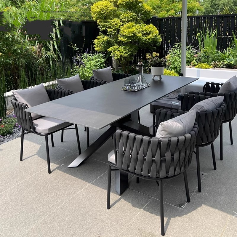 户外庭院桌椅别墅花园室外休闲岩板餐桌藤椅露天阳台防水藤编家具