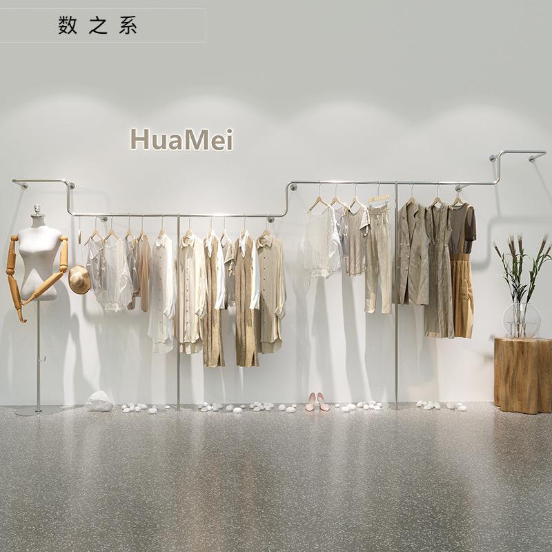 服装店展示架上墙壁挂式女装店不锈钢异型挂衣货架服装店设计
