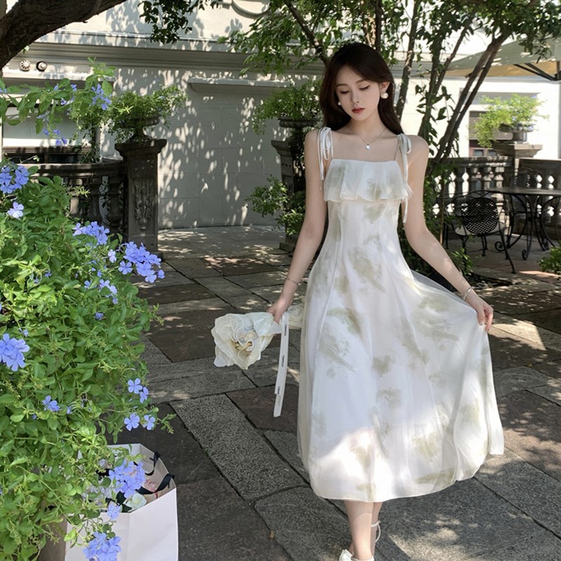 速发高级感气质吊带裙子法式荷叶边度假拍照仙气飘逸印花连衣裙