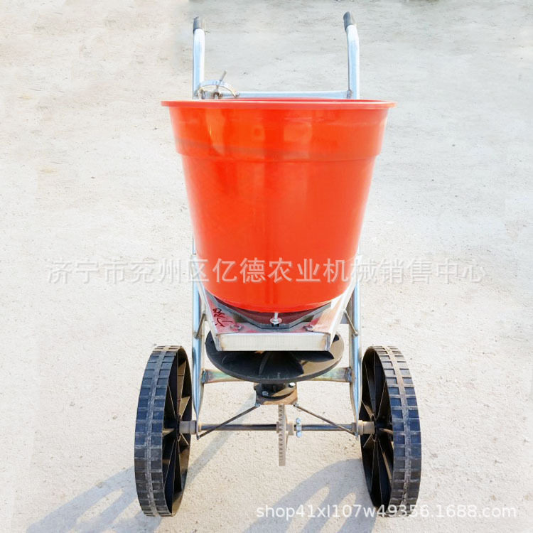 热销农用人力双轮撒肥机手推施肥播种机精播施肥机花生双粒精播机