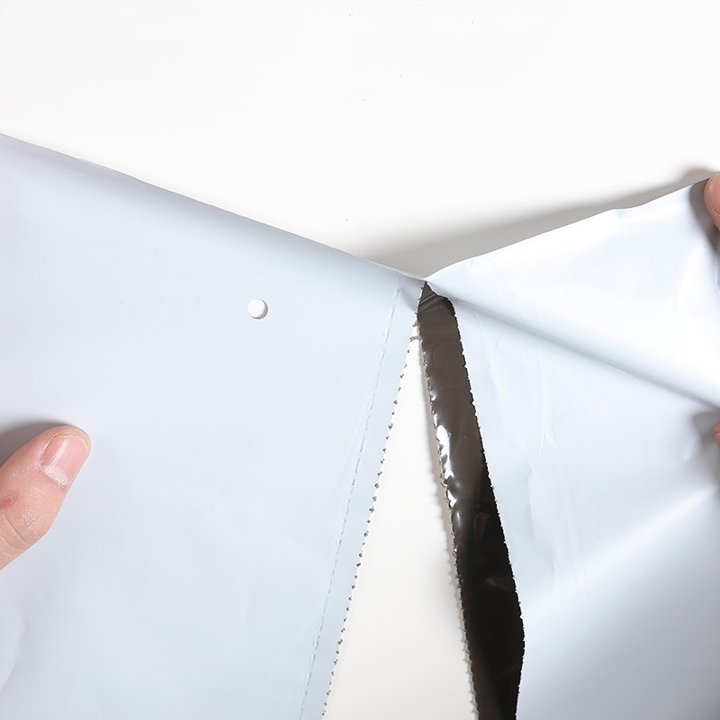 白色新料加厚连卷袋快递袋自动打包机点断式易撕口包装袋印刷LOGO