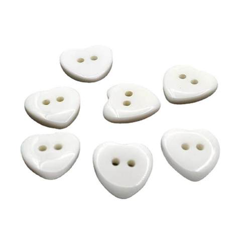 厂家直销现货心形卡通纽扣儿童装桃心树脂纽扣可染色