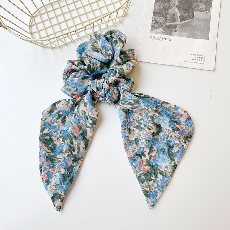 Early spring flowerNs ride rope tie head long silk row hair