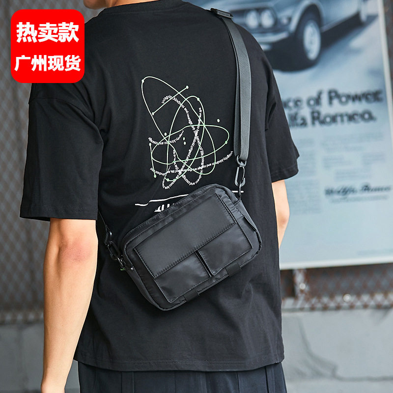 男生斜挎包潮牌韩版百搭小挎包单肩包女休闲简约背包学生日系包包