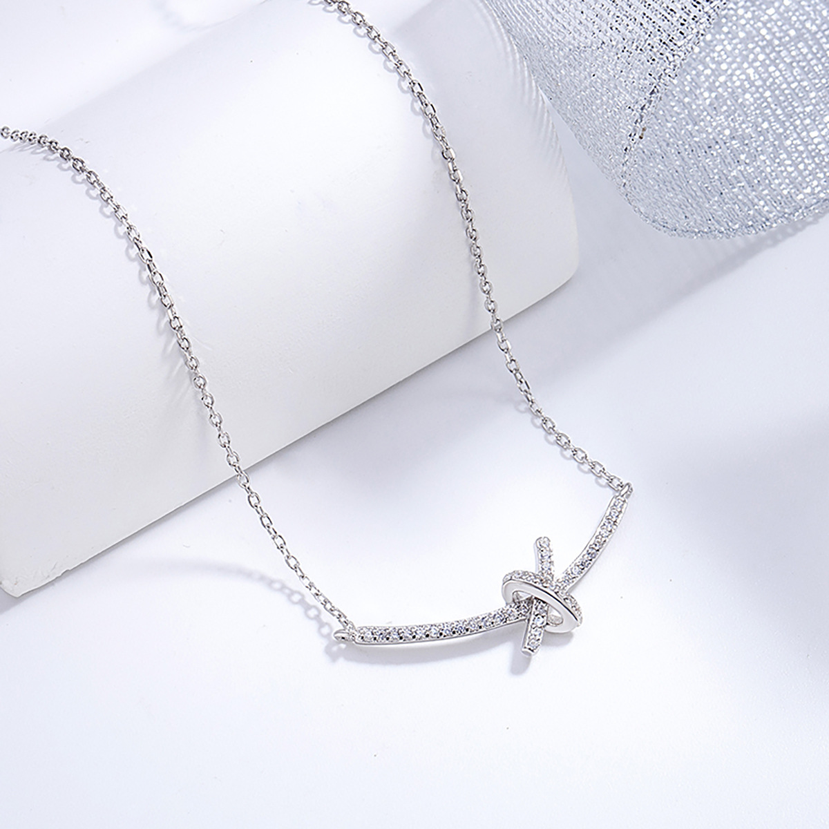 日本品质S925纯银绳结项链配饰女电镀白金蝴蝶结吊坠饰品设计款首