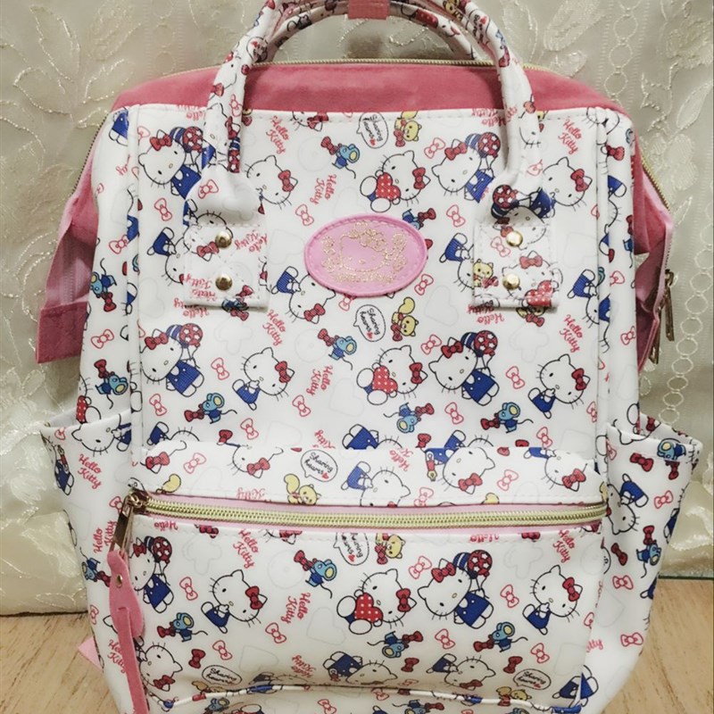 速发新款PU皮革防料蒂水面小学生中学生书包S码