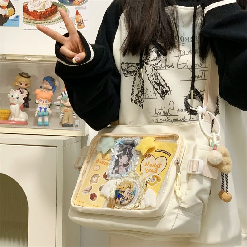 痛包斜挎大容量初中生二次元谷子挎包高颜值单肩学生党白色包包女